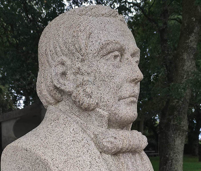 Busto, en Bermés, de José Rodríguez González.