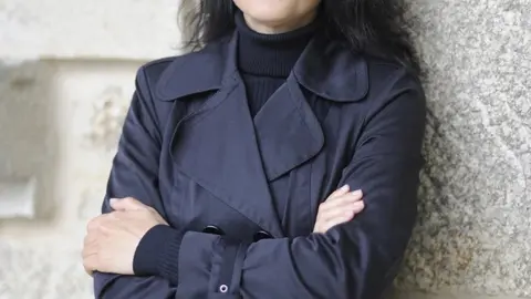 Ruth Varela y conductora del acto.
