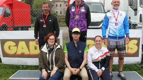 Podio de los 15 Km Walter Bouzas (Asturias, oro), López (Canarias, plata) y MenIda Ojeda (Canarias, bronce). MOEBIUS.